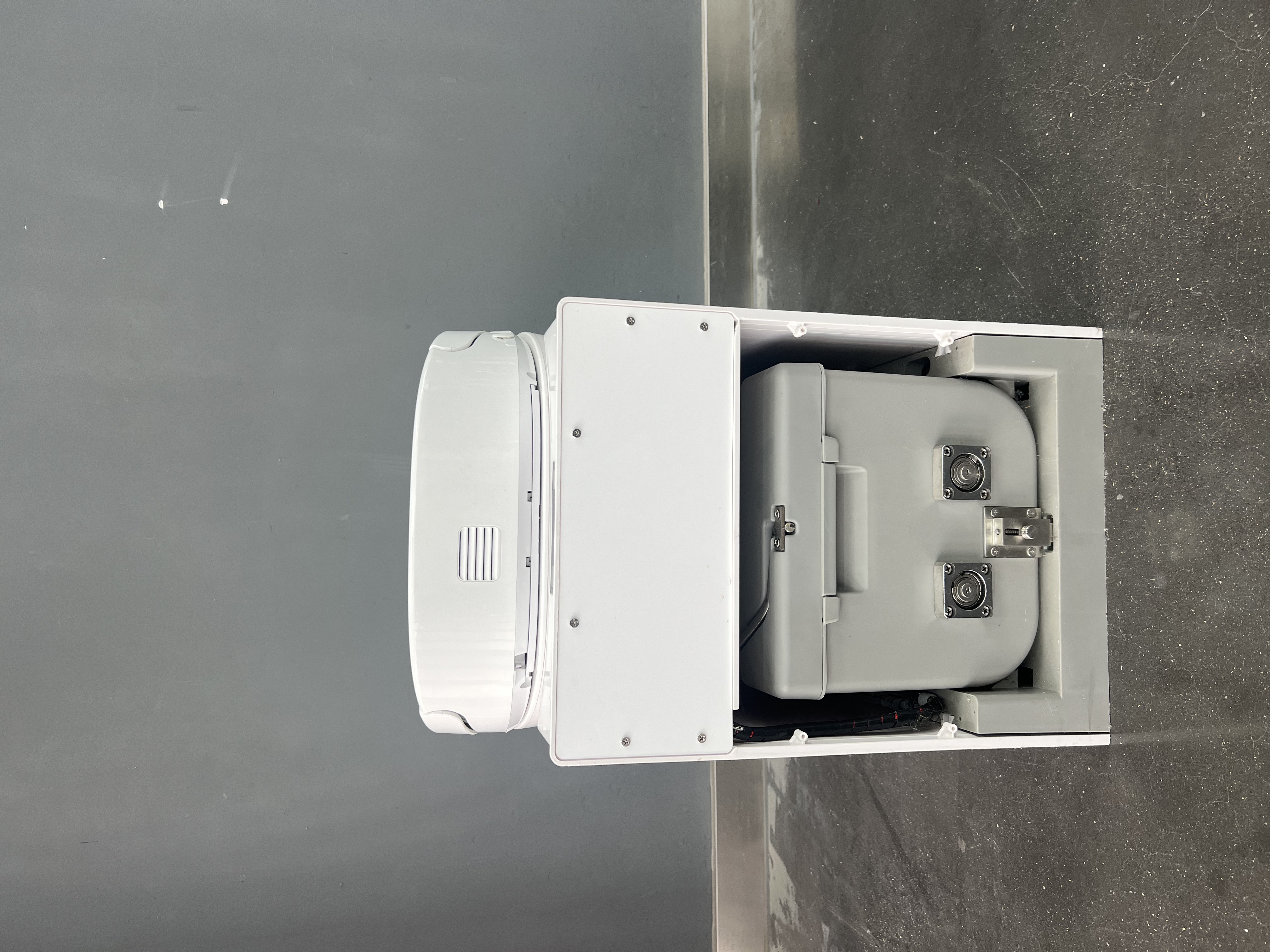 Rear service panel of toilet